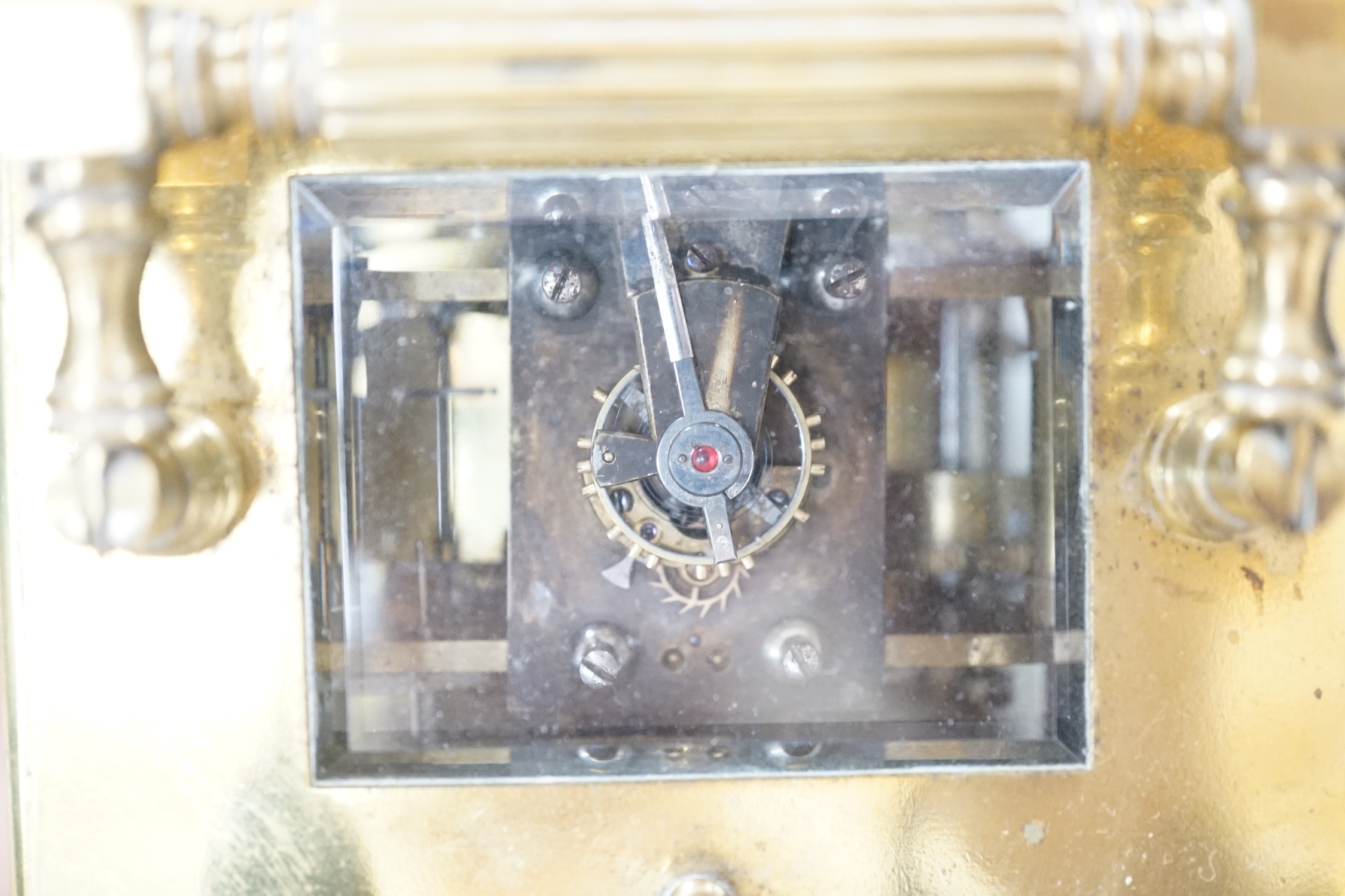 A large French gilt brass repeating carriage clock with alarm and enamel dial, 18cm high